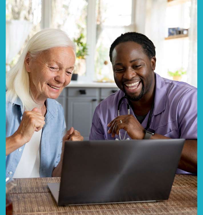 Carer looking at laptop